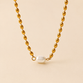 Collar dentado bañado en oro con perla