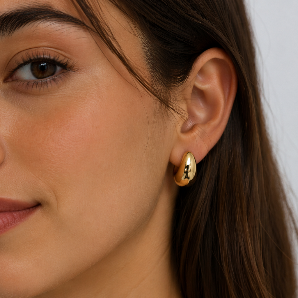 Pendientes de gota bañados en oro