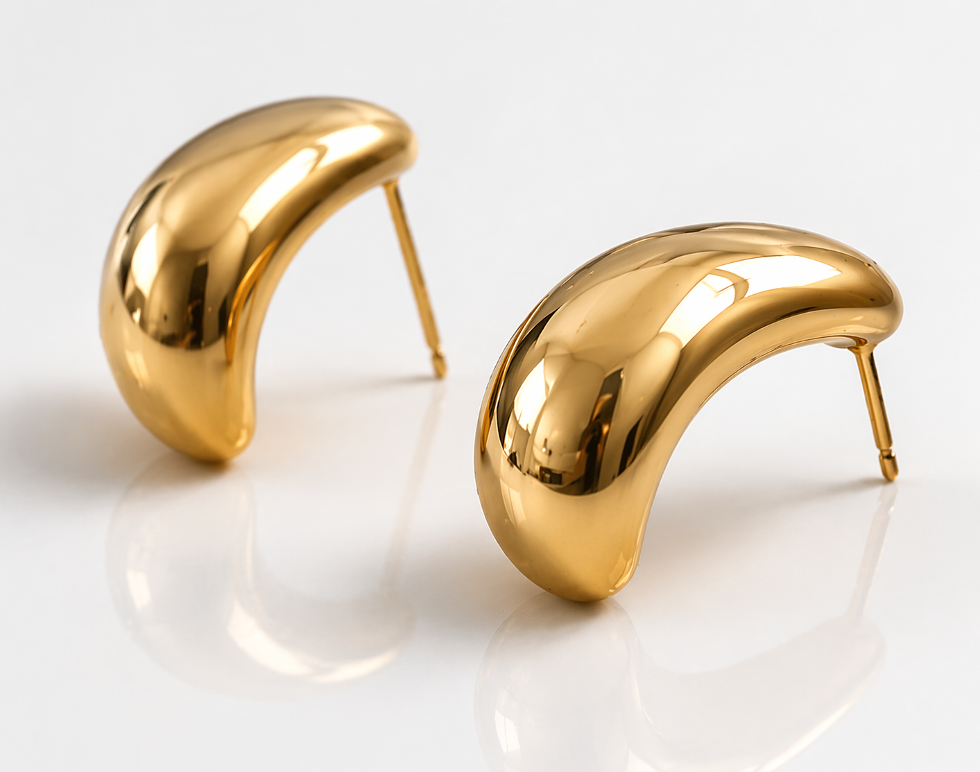 Pendientes de gota bañados en oro