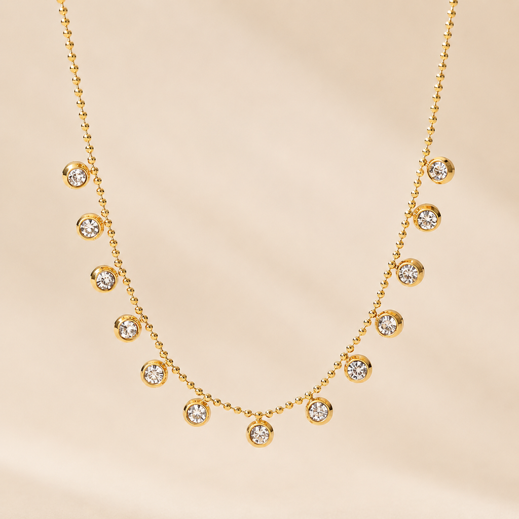 Collar con colgantes de zirconitas bañado en oro