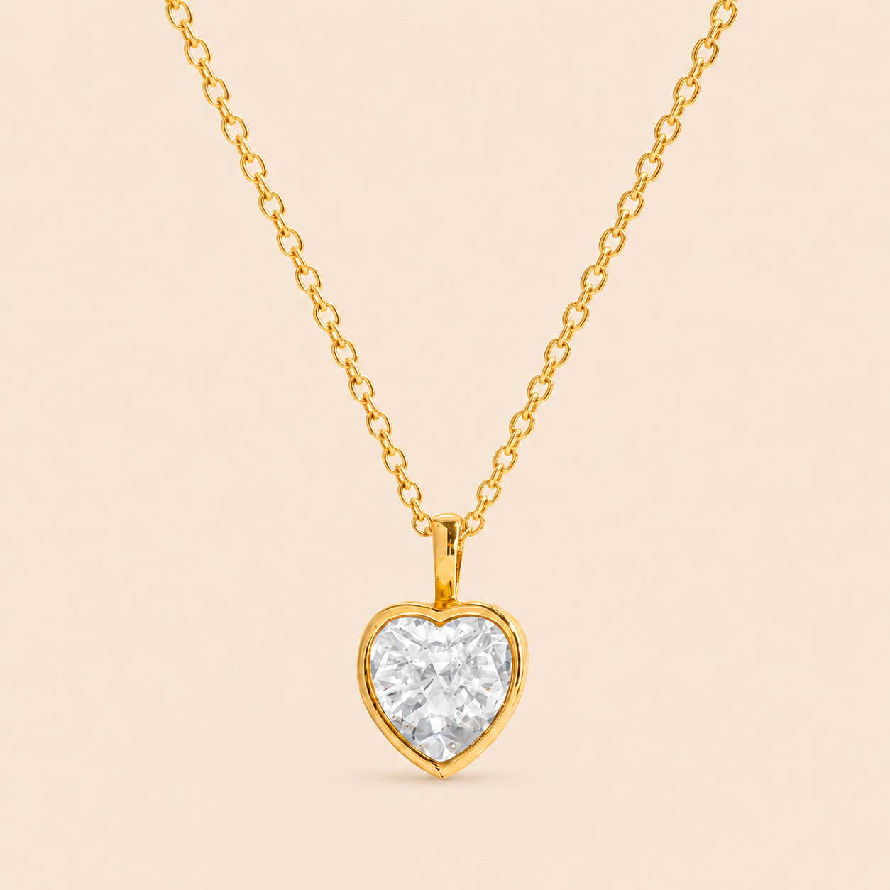 Collar de corazon bañado en oro con zirconita